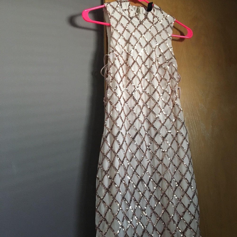 A sparkling rose gold dress